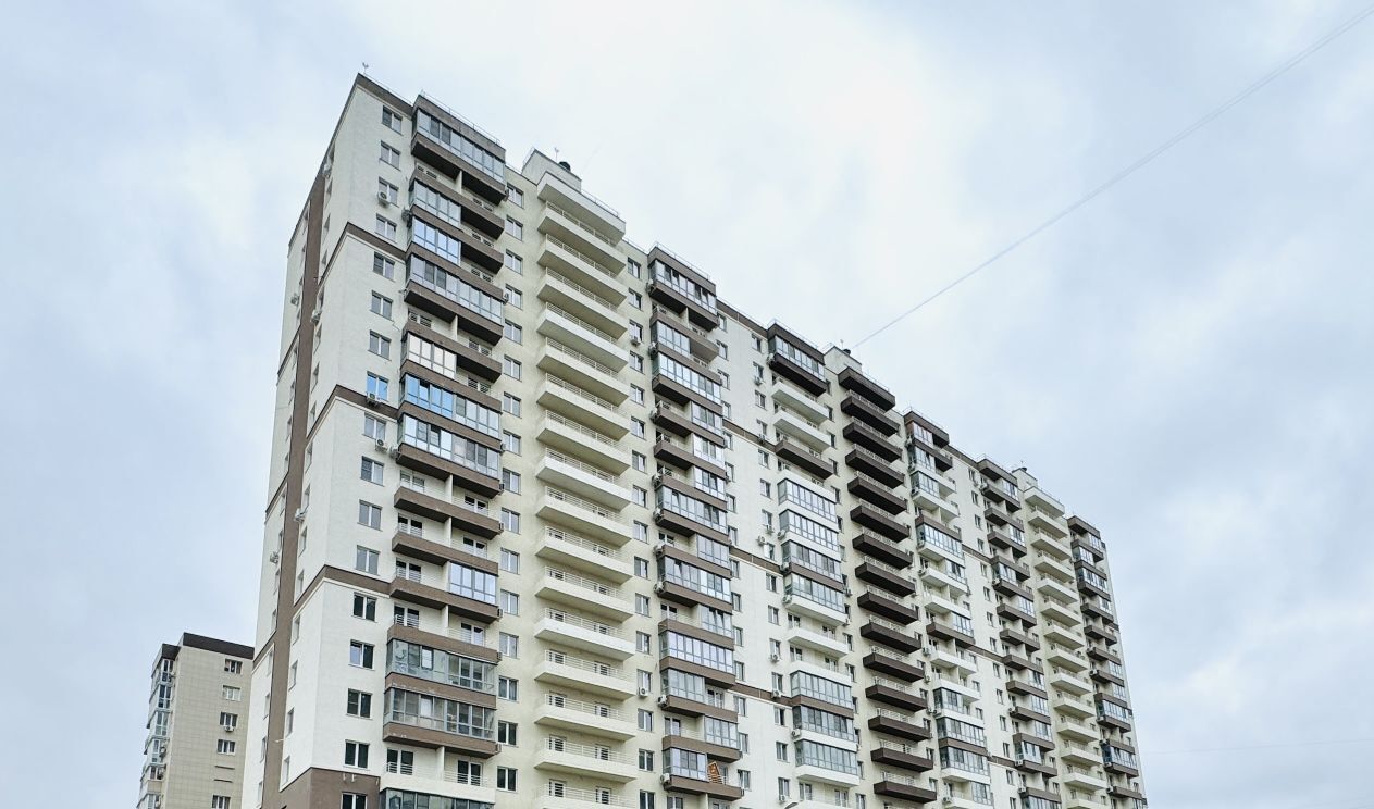 квартира г Волгоград р-н Дзержинский ул им. Расула Гамзатова 21 фото 1