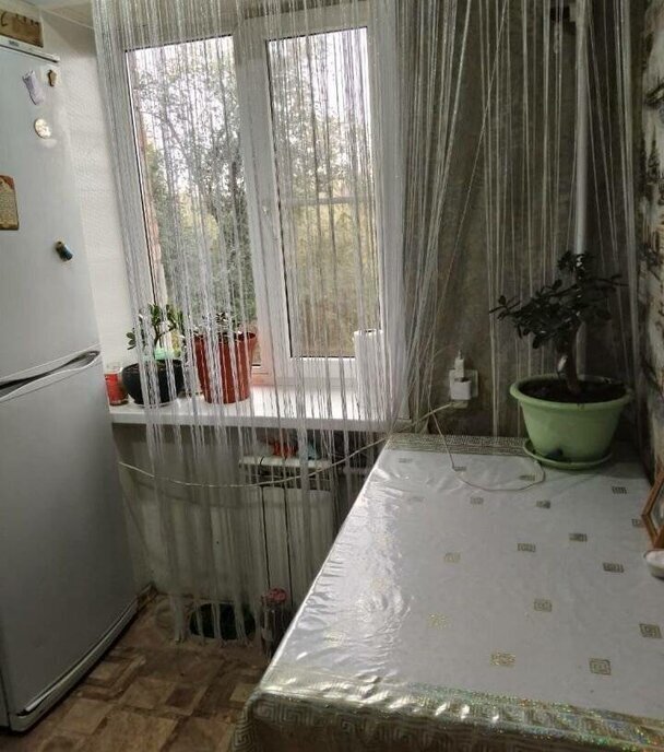 квартира г Каменск-Шахтинский ул Украинская 58 фото 7