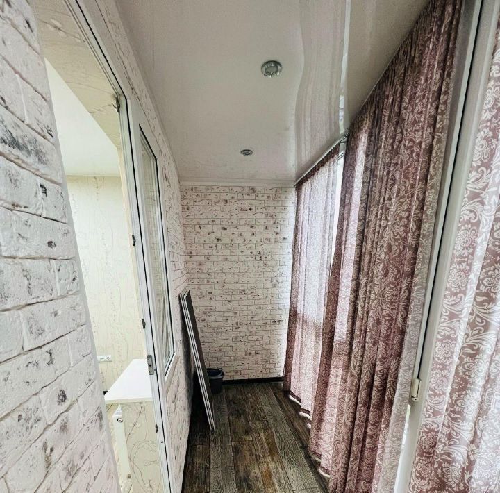 квартира г Волгоград р-н Дзержинский ул 8-й Воздушной Армии 14 фото 17