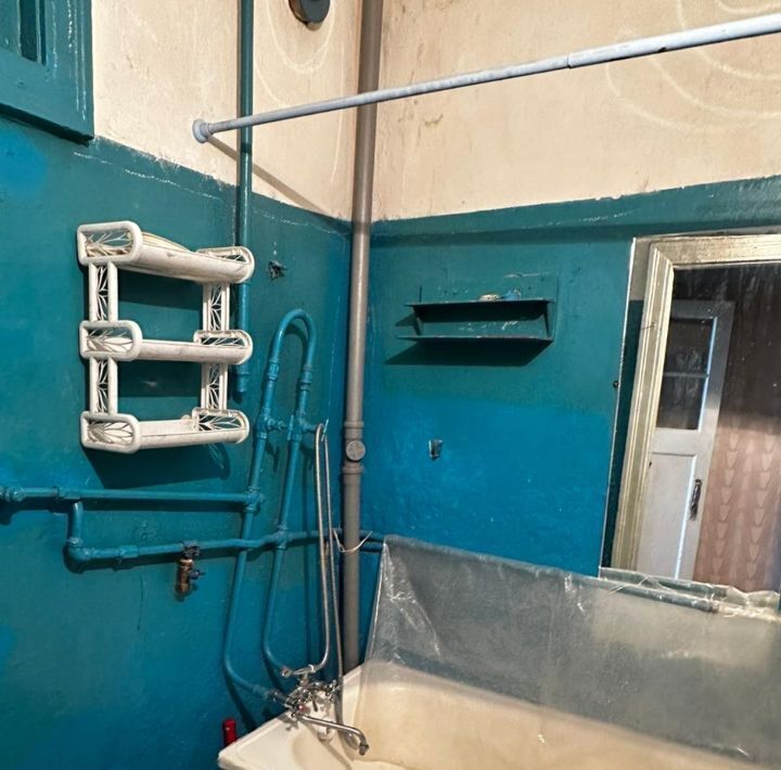 комната г Волгоград р-н Тракторозаводский ул им. Дегтярева 23 фото 4