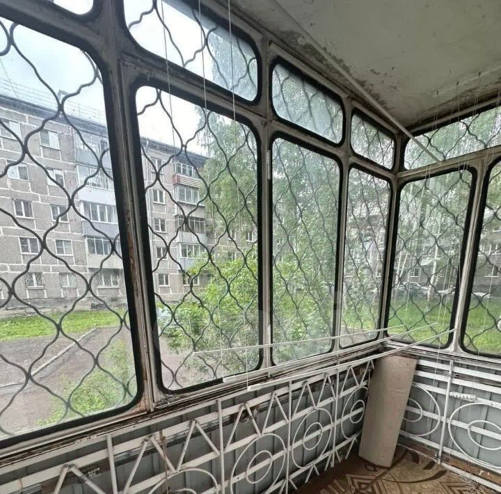 квартира г Осинники ул 50 лет Октября 14а фото 15